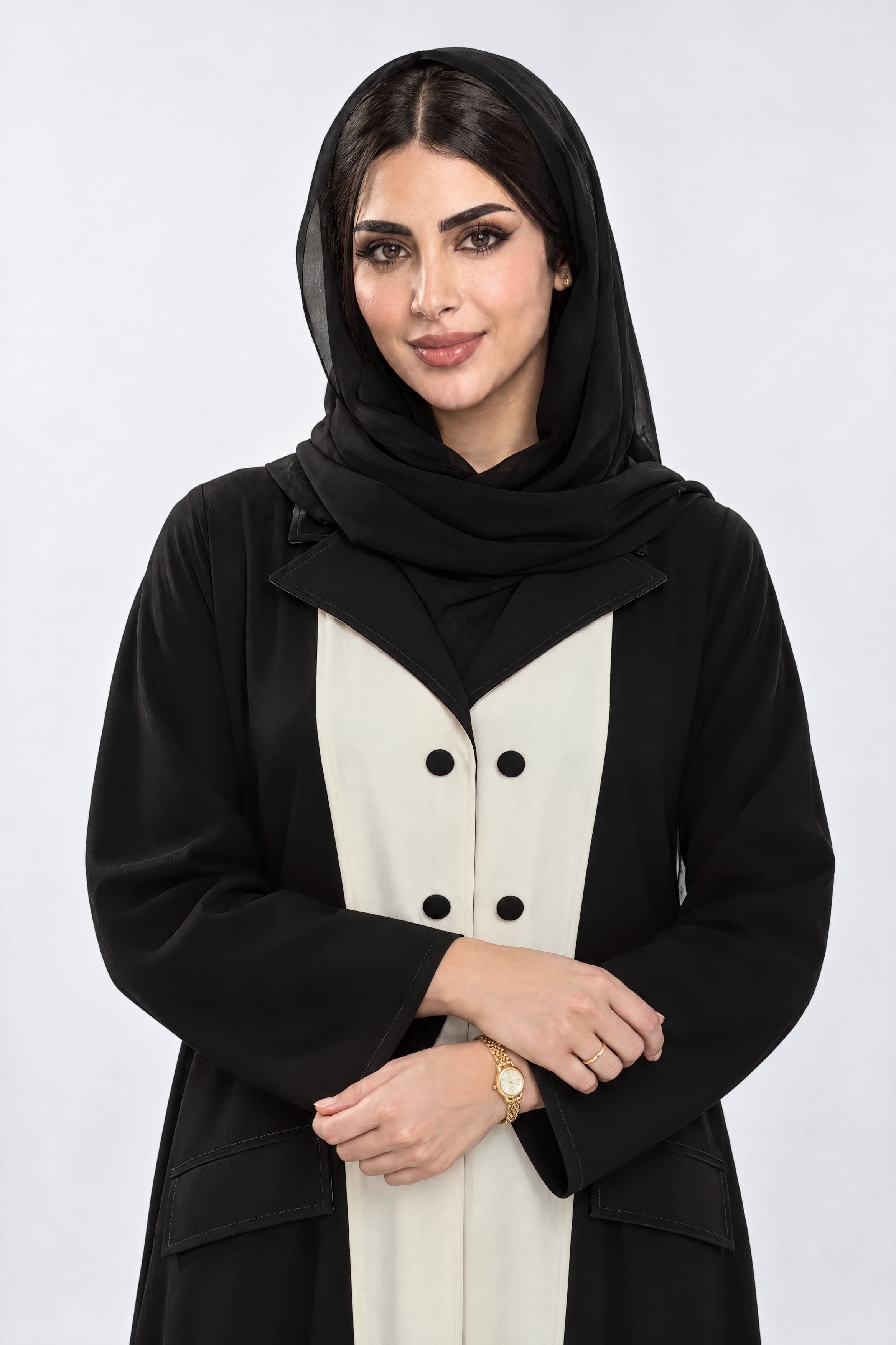 Blazer-crepe abaya with side pockets and a matching scarf.